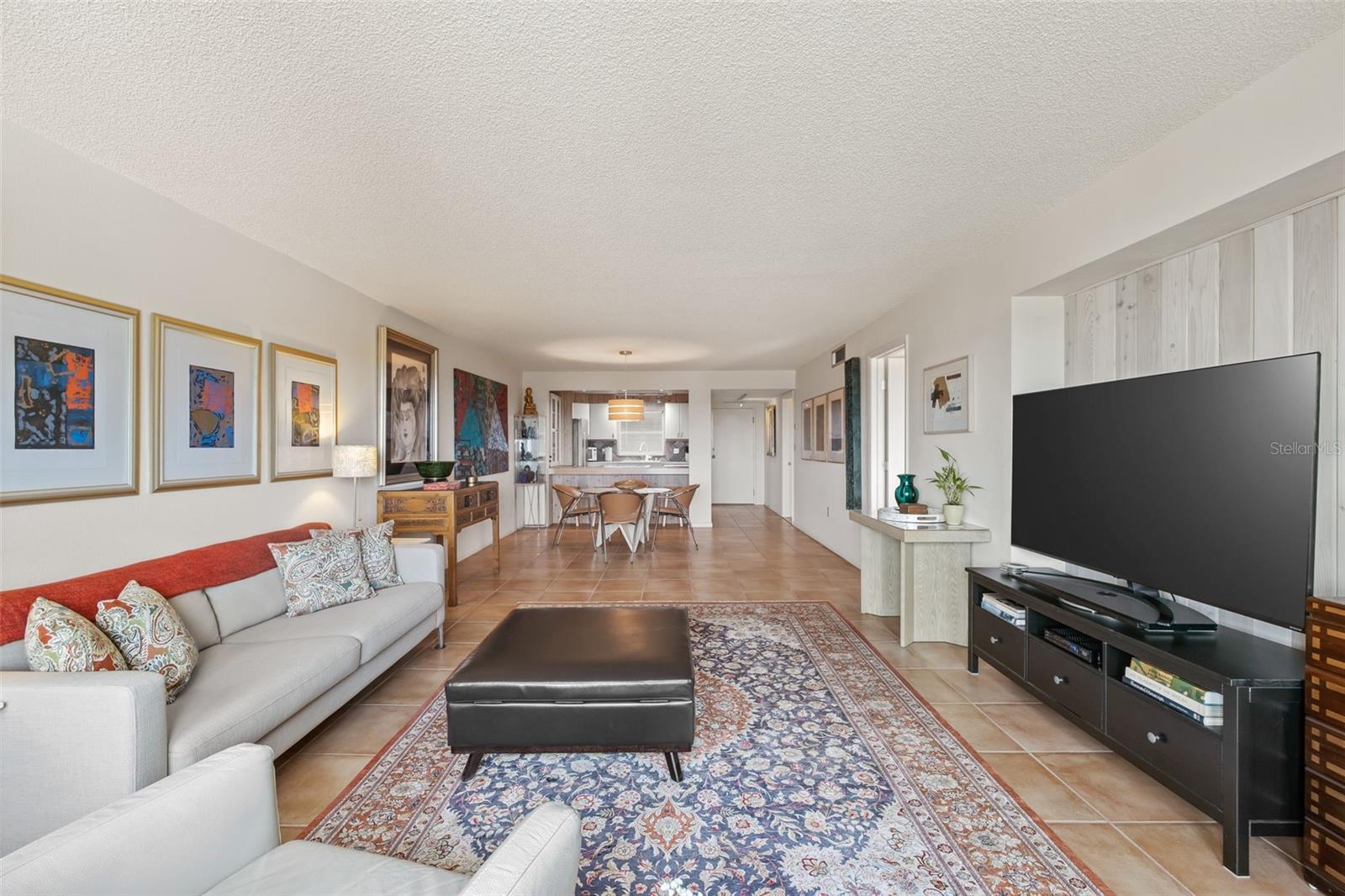 All main rooms feature tile floors.