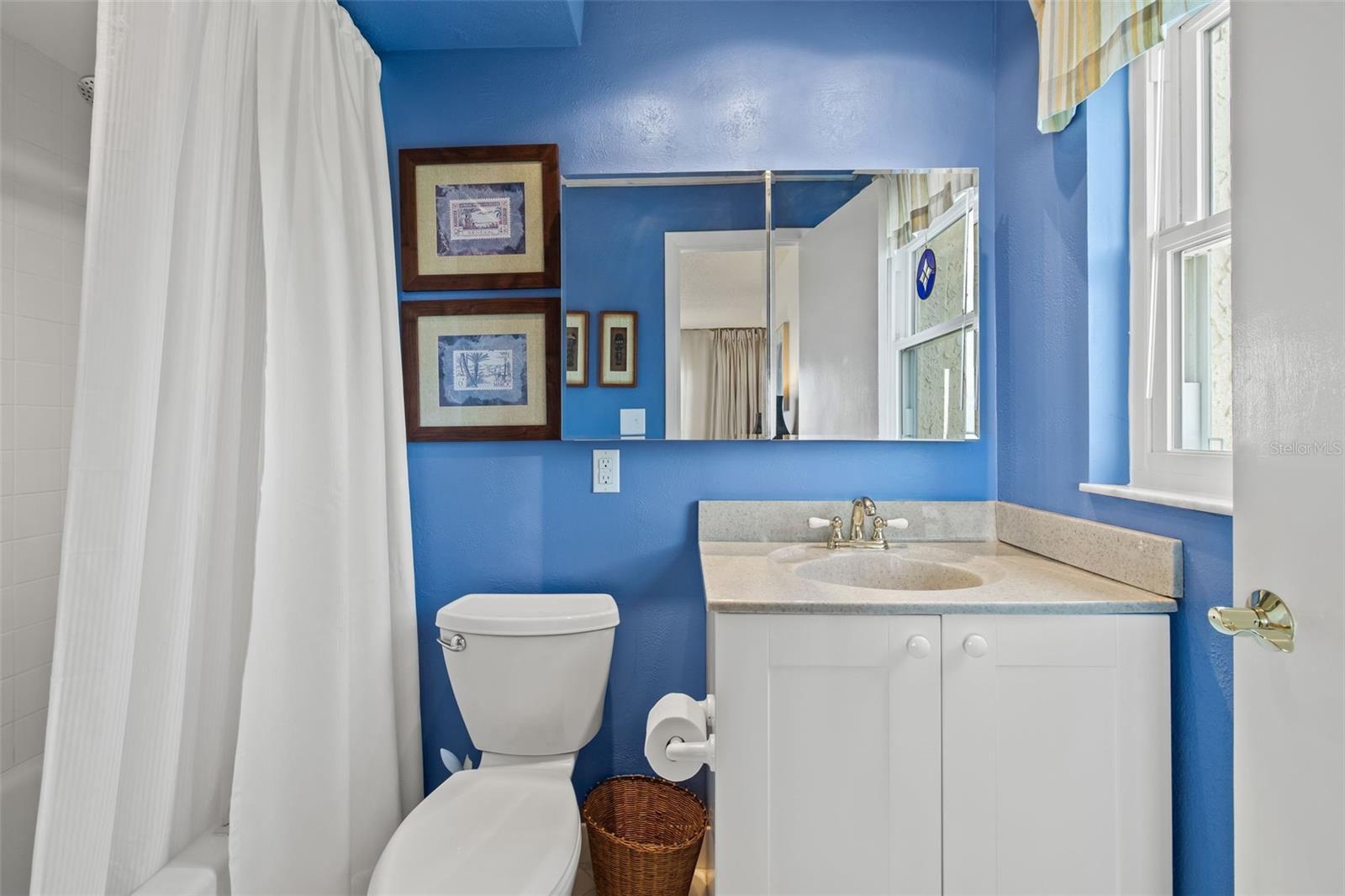 Fresh and perfect en-suite primary bathroom.