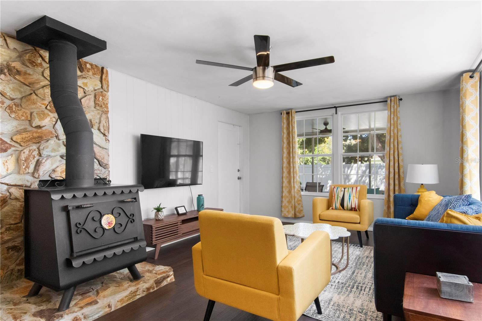 Original wood burning stove in Family Room