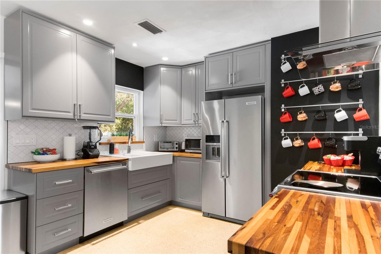 Sleek and functional IKEA kitchen is the center of this charming home.