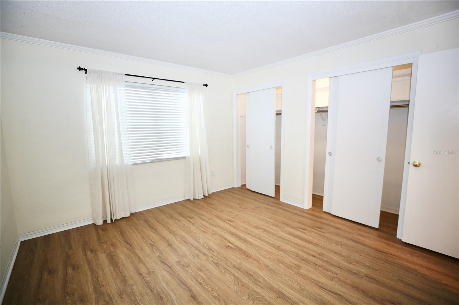 Wall-to-wall closet in second bedroom