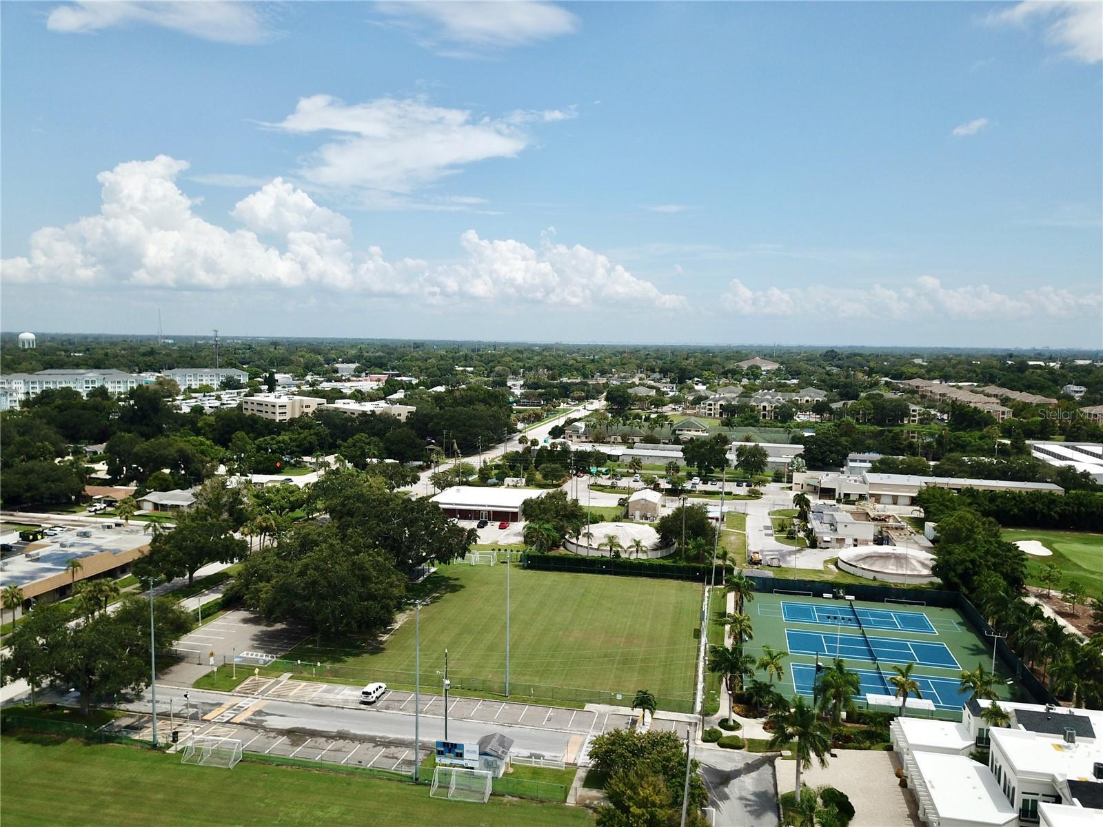 Rec Center fields and tennis / pickleball courts in front of and east of condo..