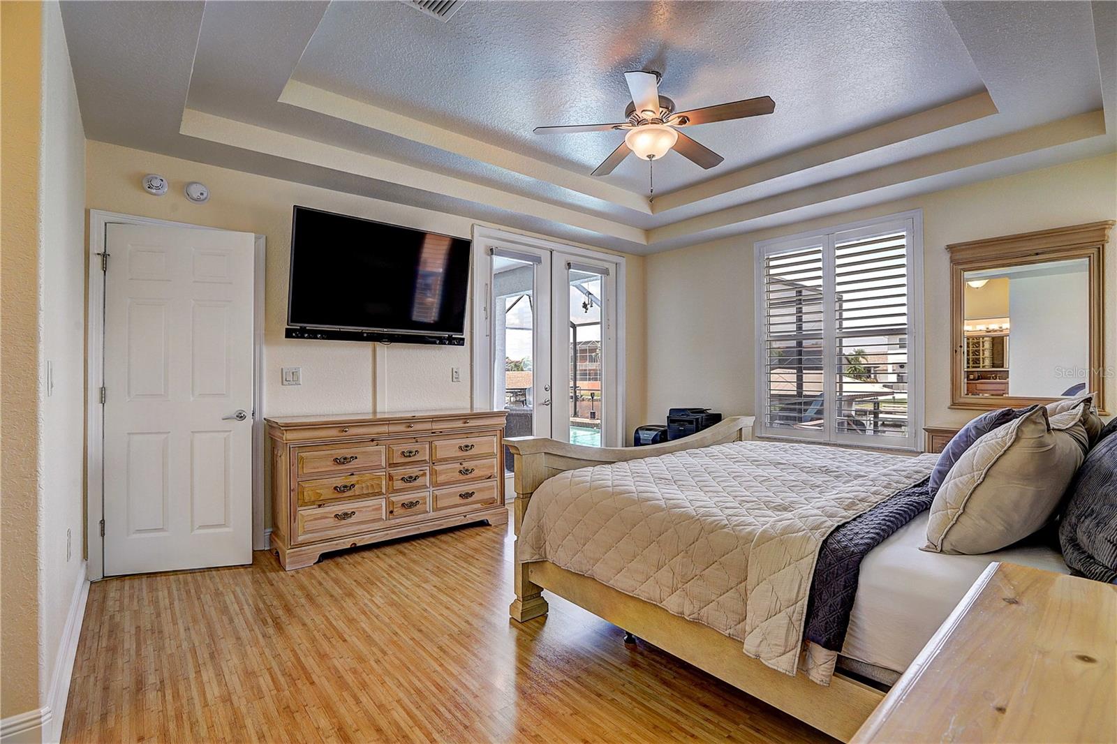 Primary Bedroom with doors to lanai