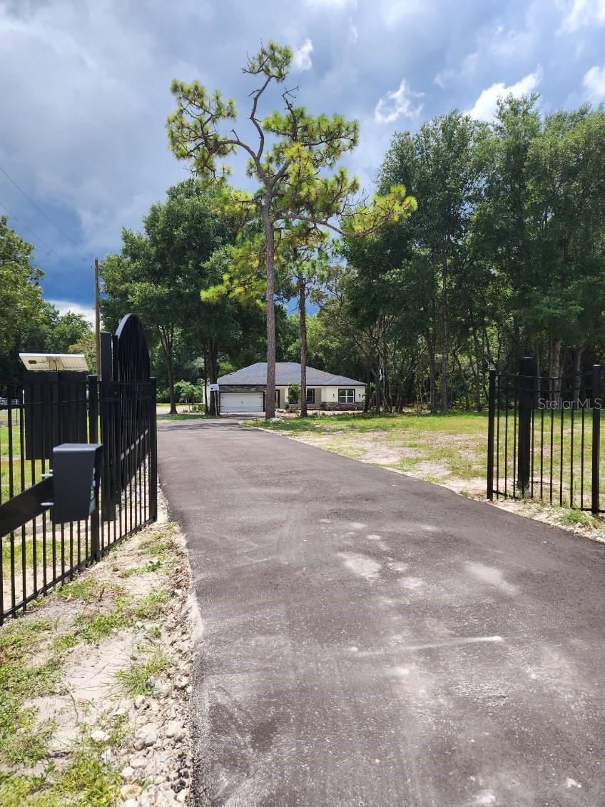 200 ft freshly poured blacktop  private driveway