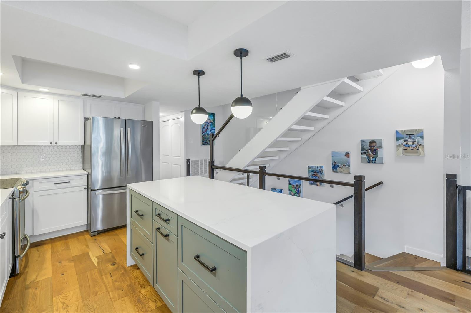 Drawers in the kitchen for pots and pans, pendant lighting