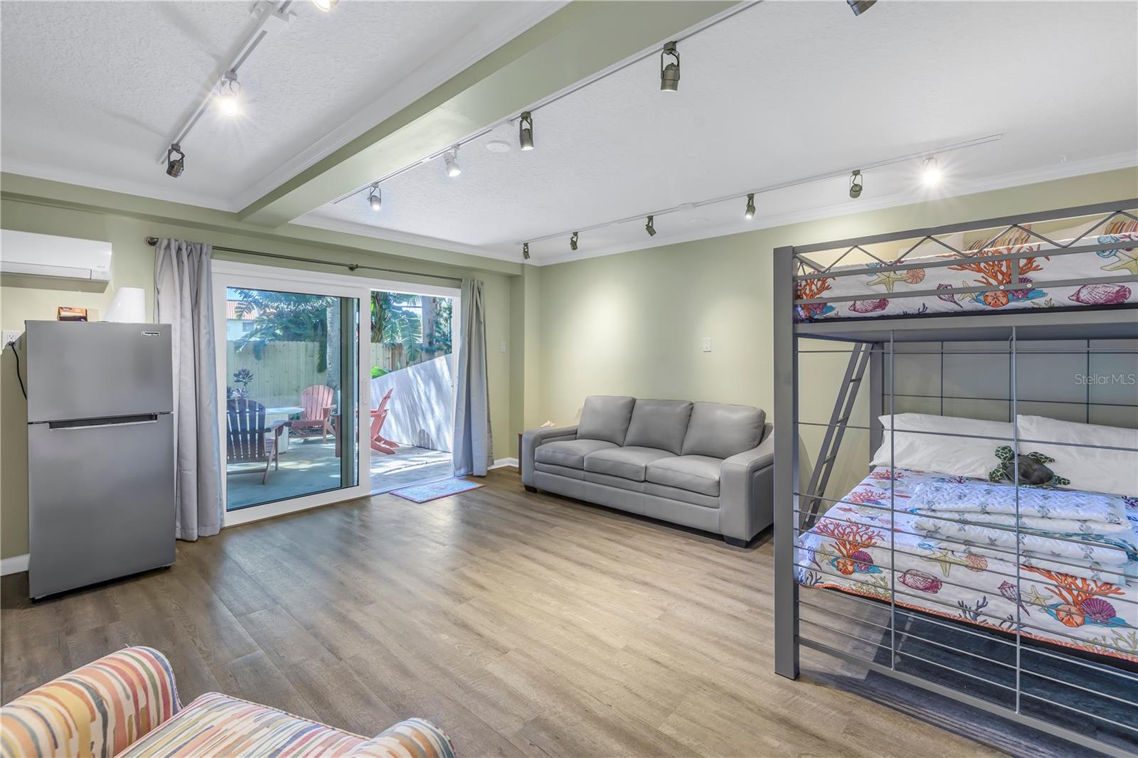 Bonus room with sliding doors to the patio