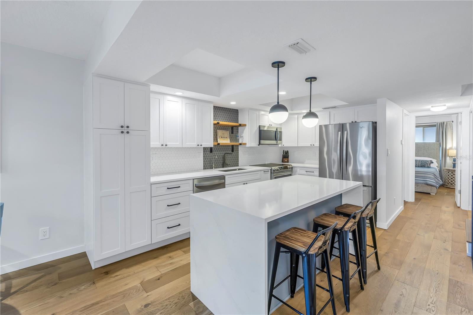 Stunning kitchen with white shaker style cabinets