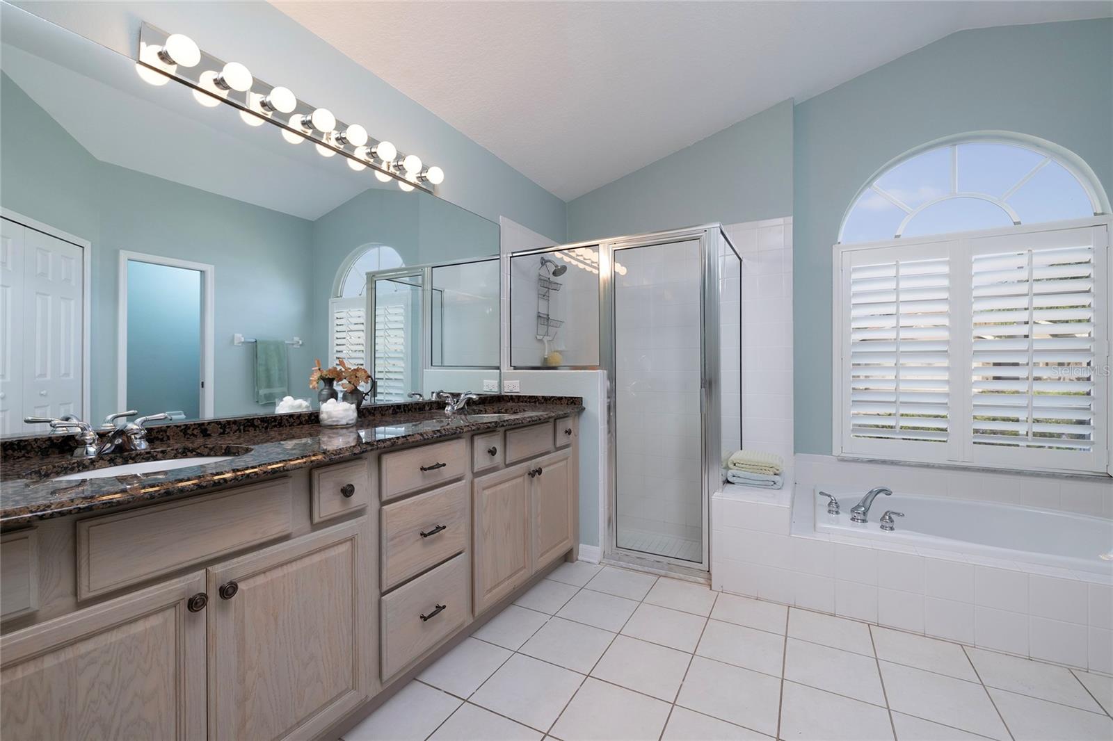 Primary bathroom - Granite counters, double sinks and walk in shower