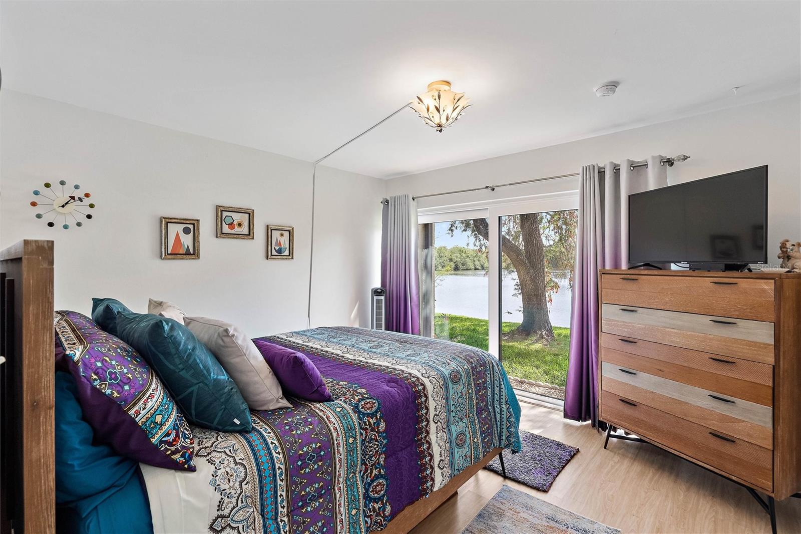 Primary Bedroom with lake views