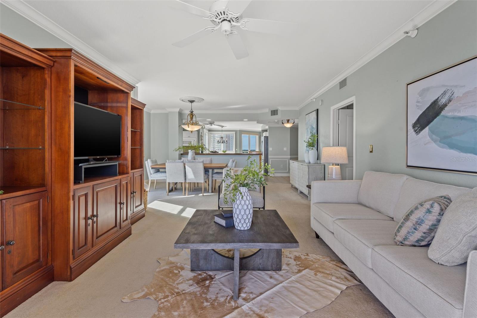 Living room is large enough for a couch, large chair, and entertainment system.