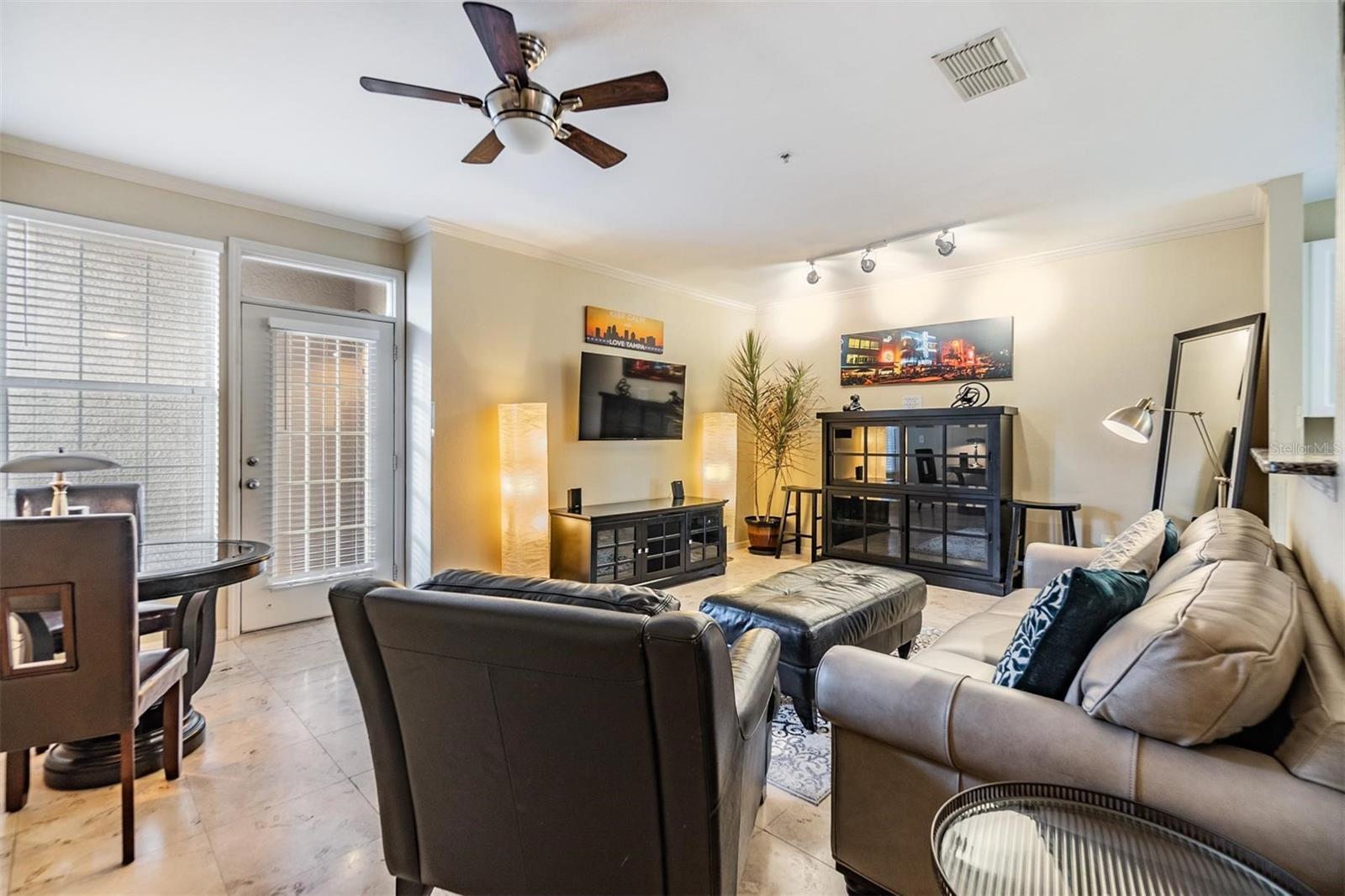 Spacious living room with patio access.