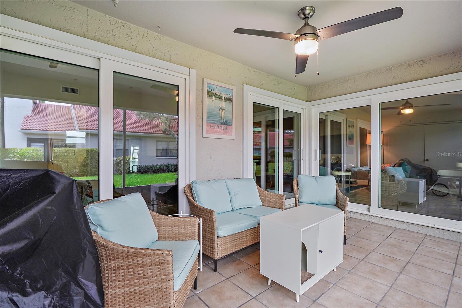 back patio with some furnishings - condo currently unfurnished