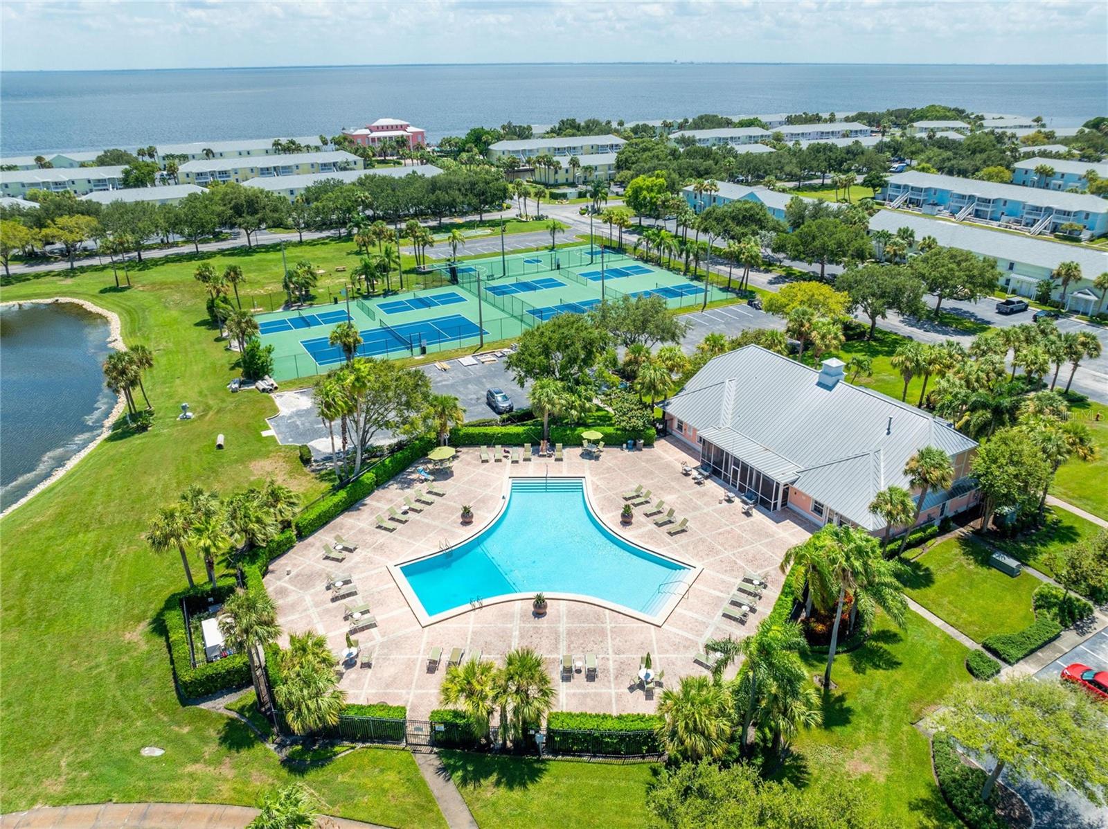 Looking towards your new home, just steps from the waterfront pink clubhouse