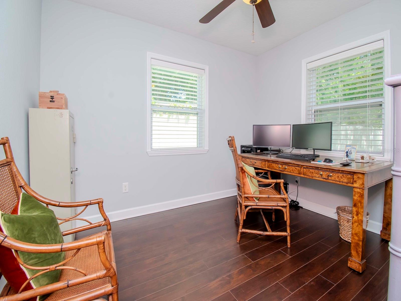 Bedroom 3 that is currently being used as a home office.