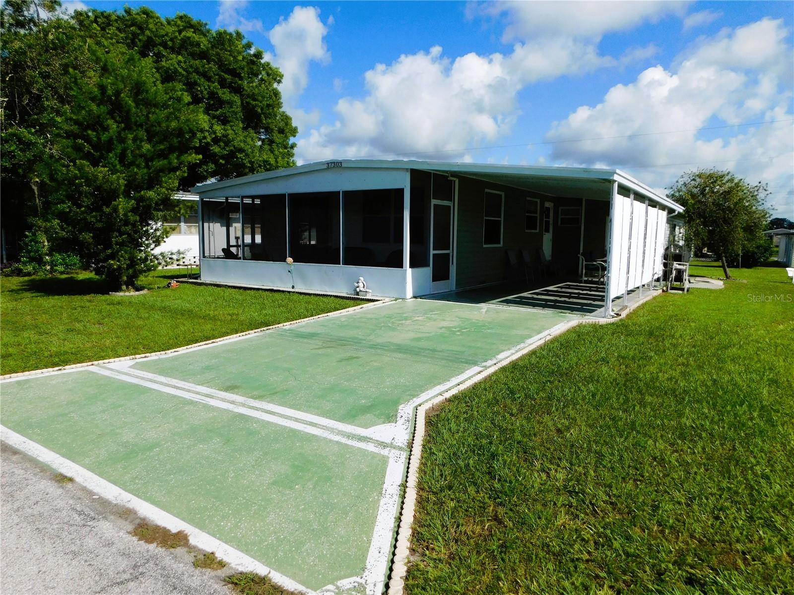 This home has many updates including this painted driveway.