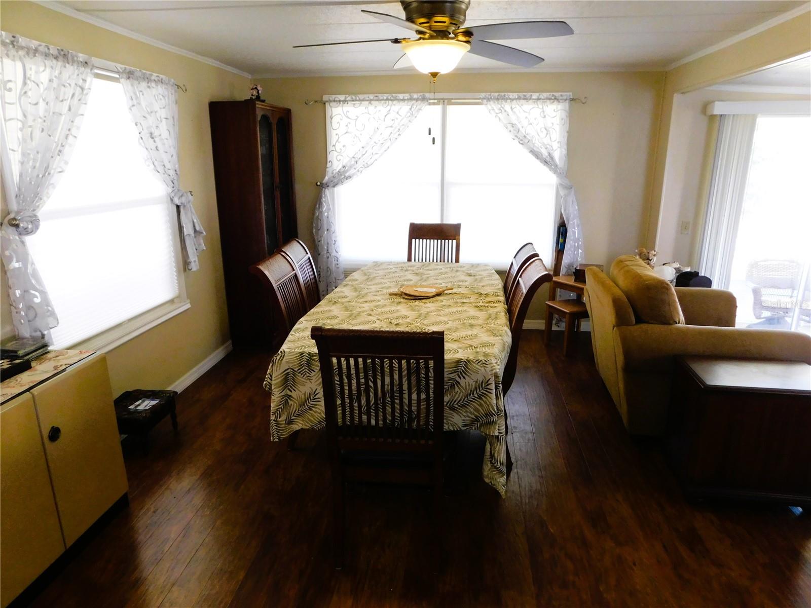 Dining area is open with kitchen and living room.