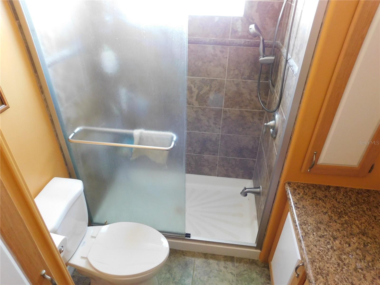 Primary retreat has step-in tile shower!