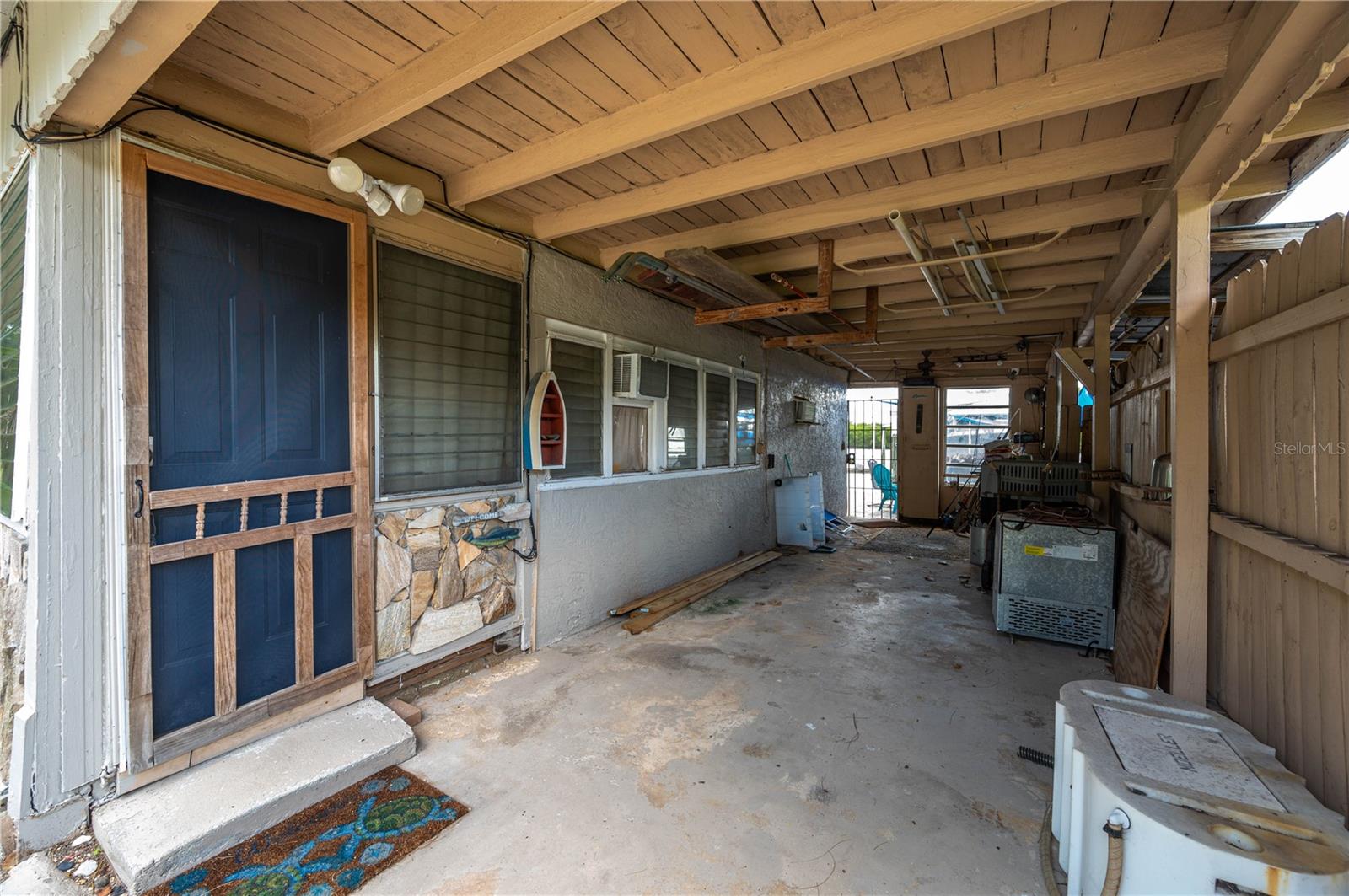 FRONT ENTRY & GATE ENTRY TO WATERFRONT PATIO