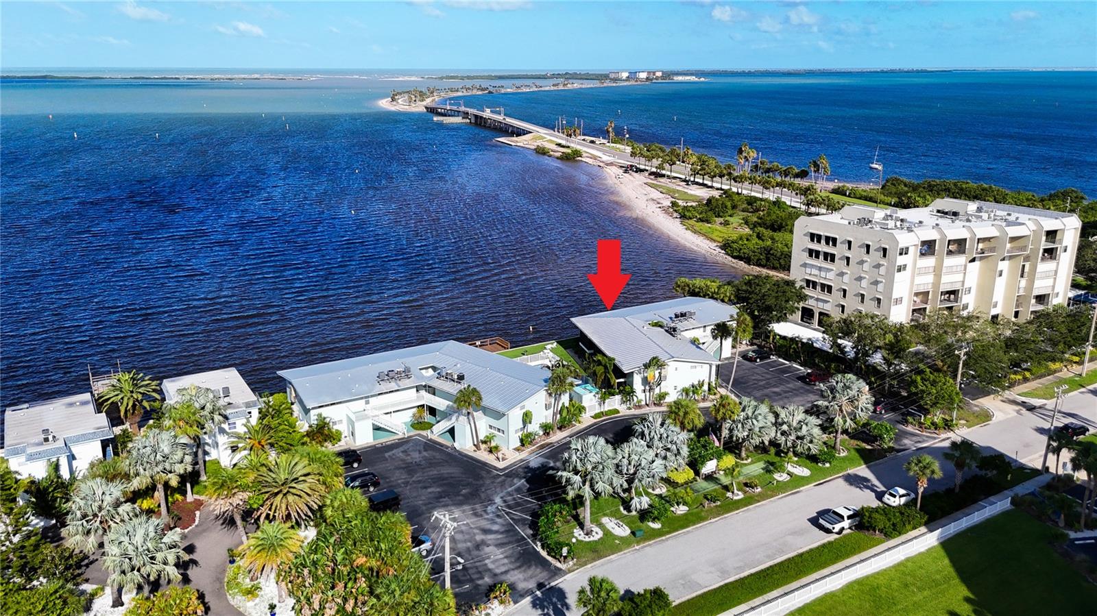 PRIME Water-view location! Boutique complex right on St Joseph's Sound in Dunedin- Only 24 units total ( 12 per building) This studio condo overlooks the Dunedin causeway, Honeymoon Island, Caladesi Island & Clearwater Beach!