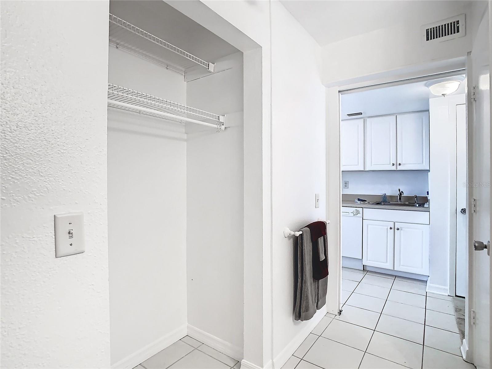 You are in the lavatory, view towards the kitchenette. Behind you is the LARGE walk-in shower. to your right ( out of view) is the vanity & commode.