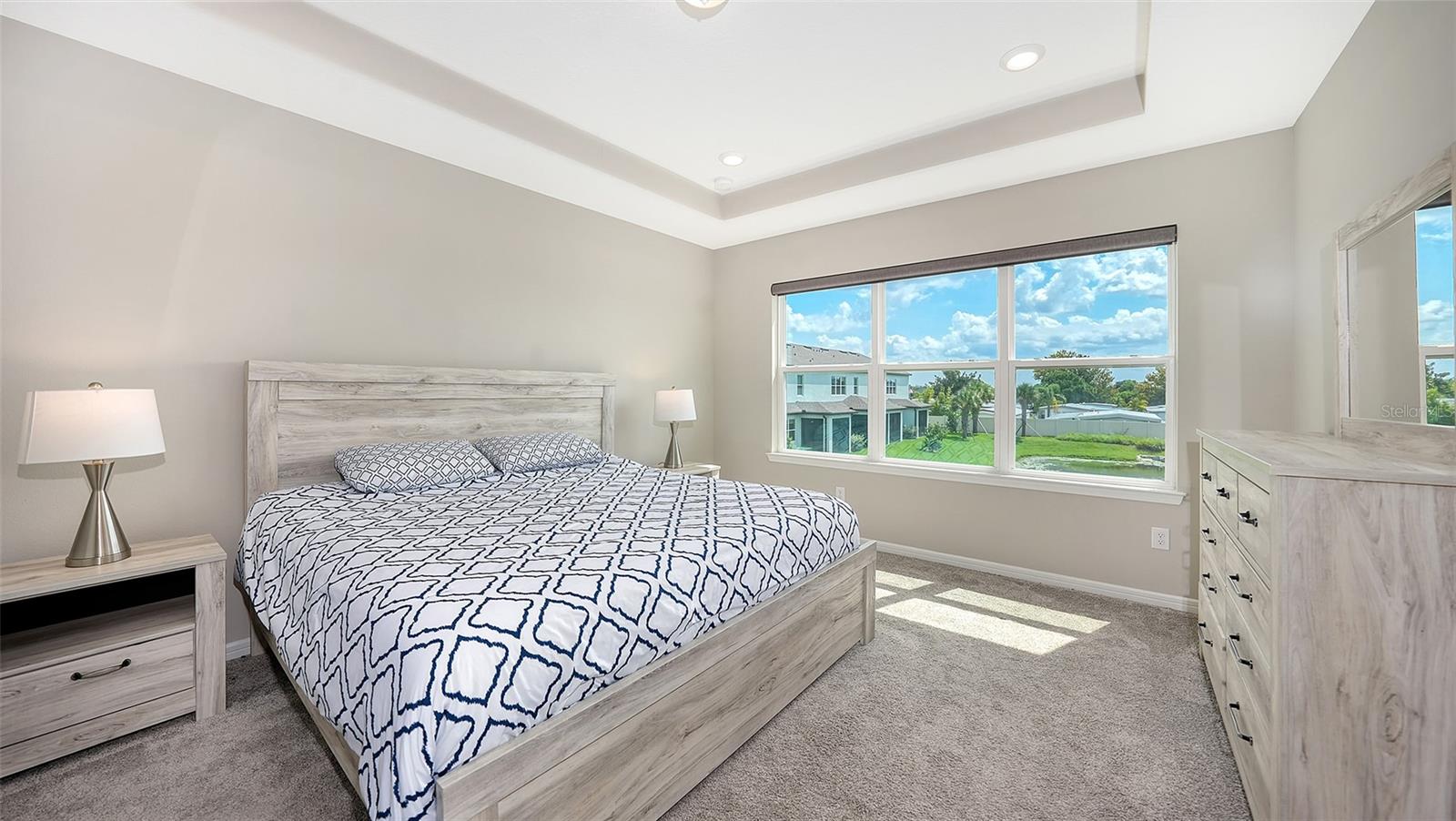 Primary bedroom upstairs with water views