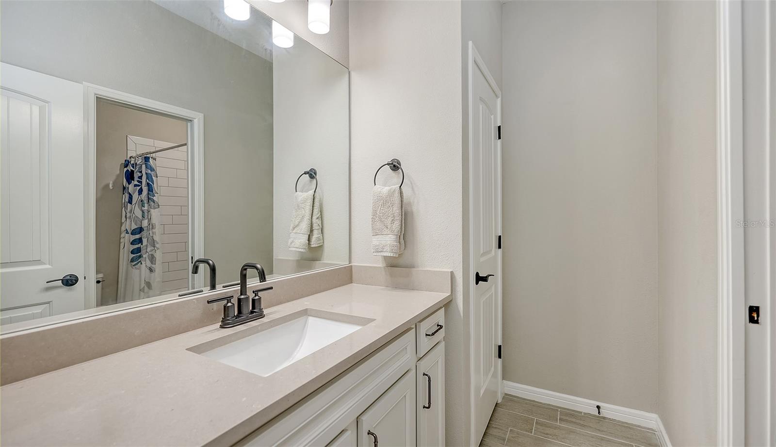 2nd bathroom upstairs with bath/shower combo