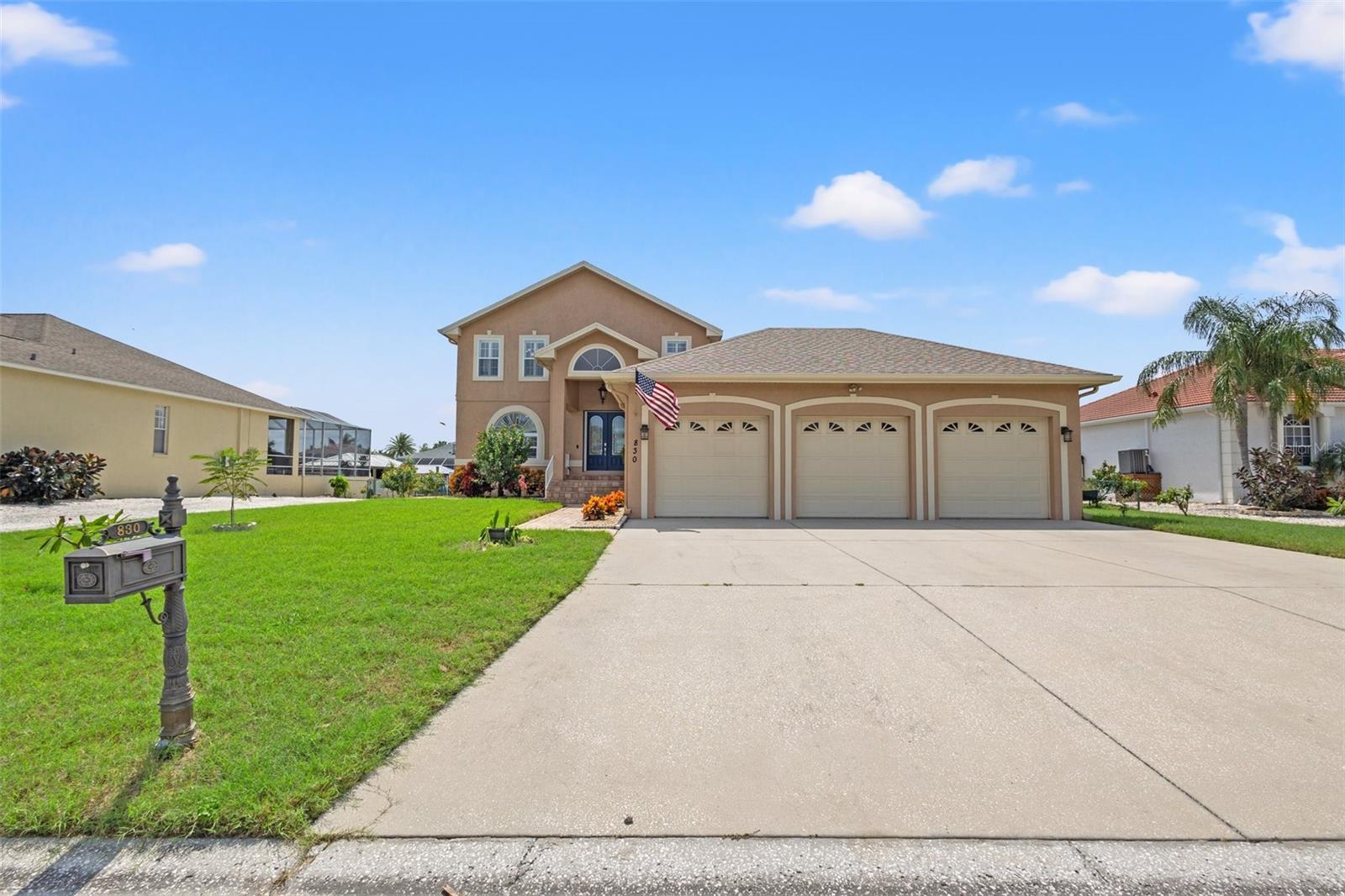 Front of this beautiful waterfront 4/3 home with a 3 car garage and nice elevation