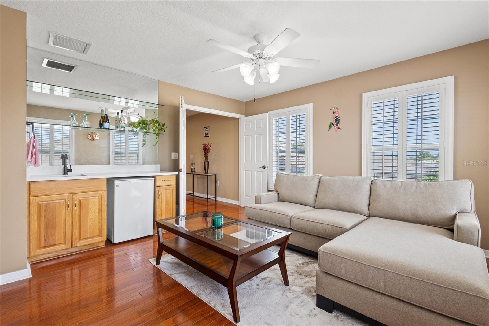 Upstairs bonus room with a wet bar