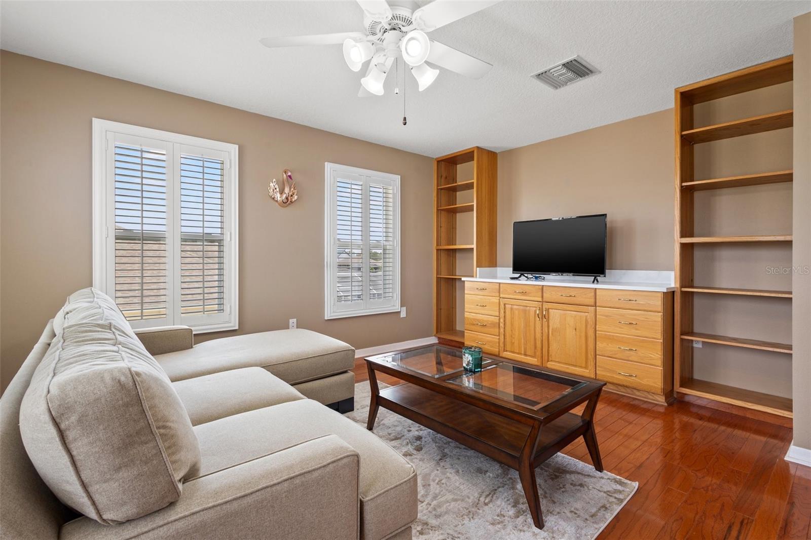 Upstairs bonus room with a wet bar