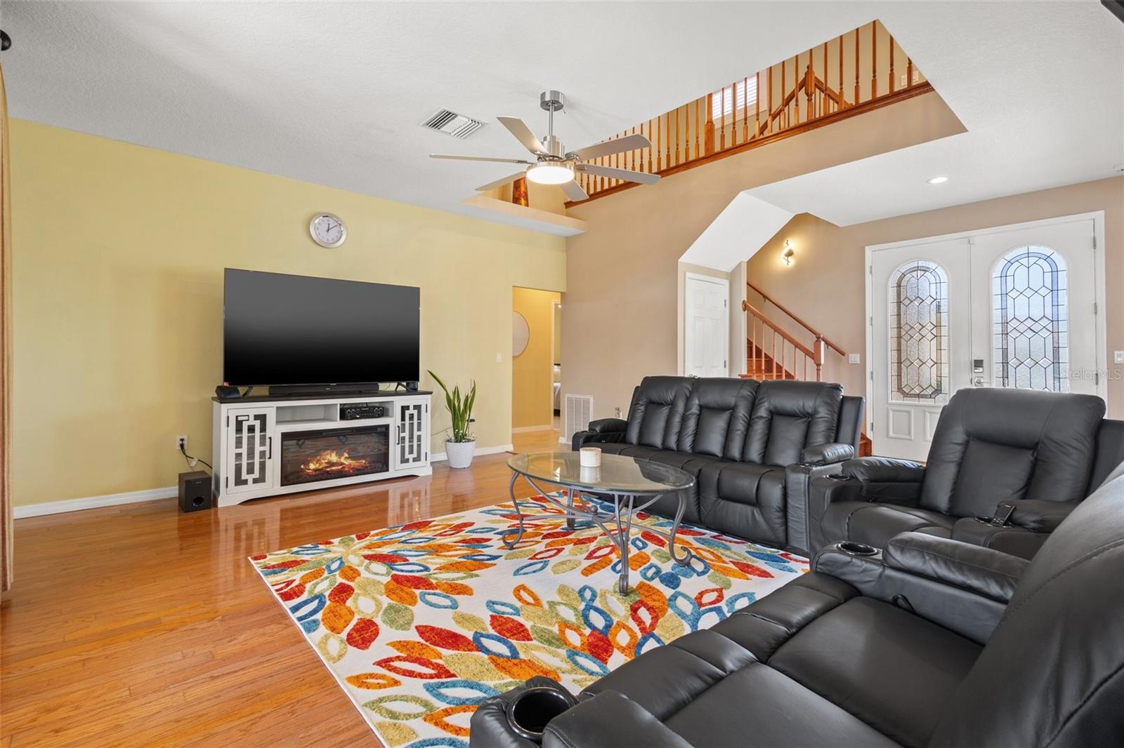 Family Room with view to the jack and Jill bedroom #3 and #4 and stairway to the bonus room and primary bedroom