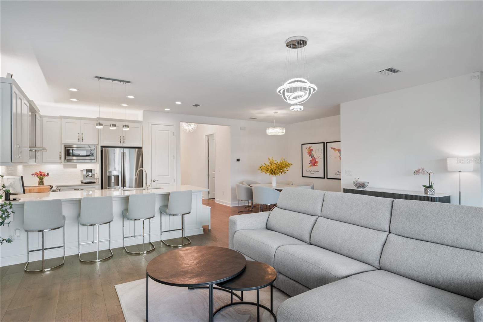 Living Room and Closer View of Kitchen