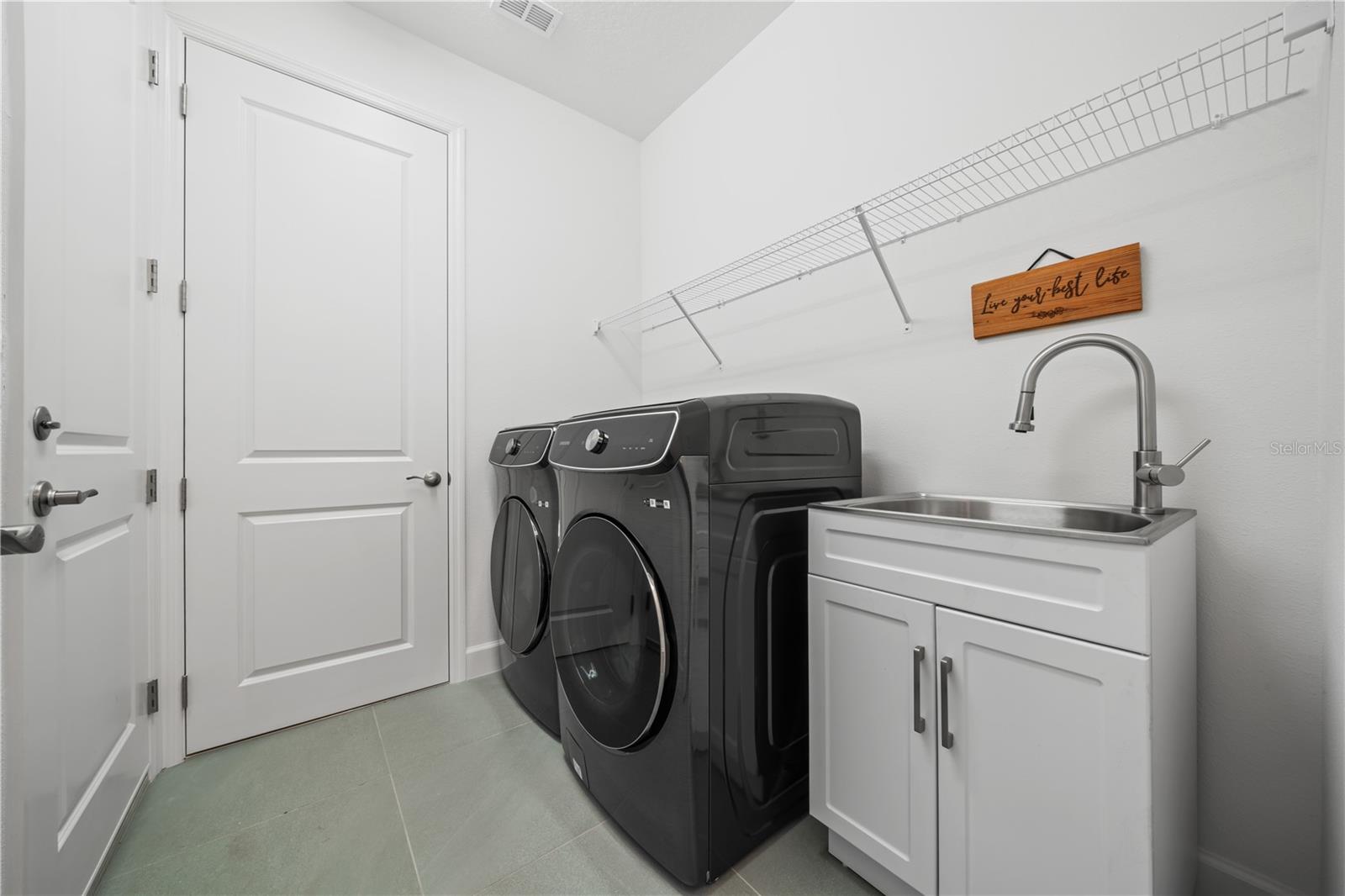 Spacious Laundry Room and Sink