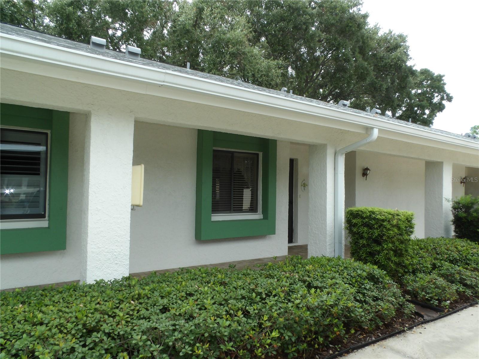 Front Exterior - Assigned Carport Parking