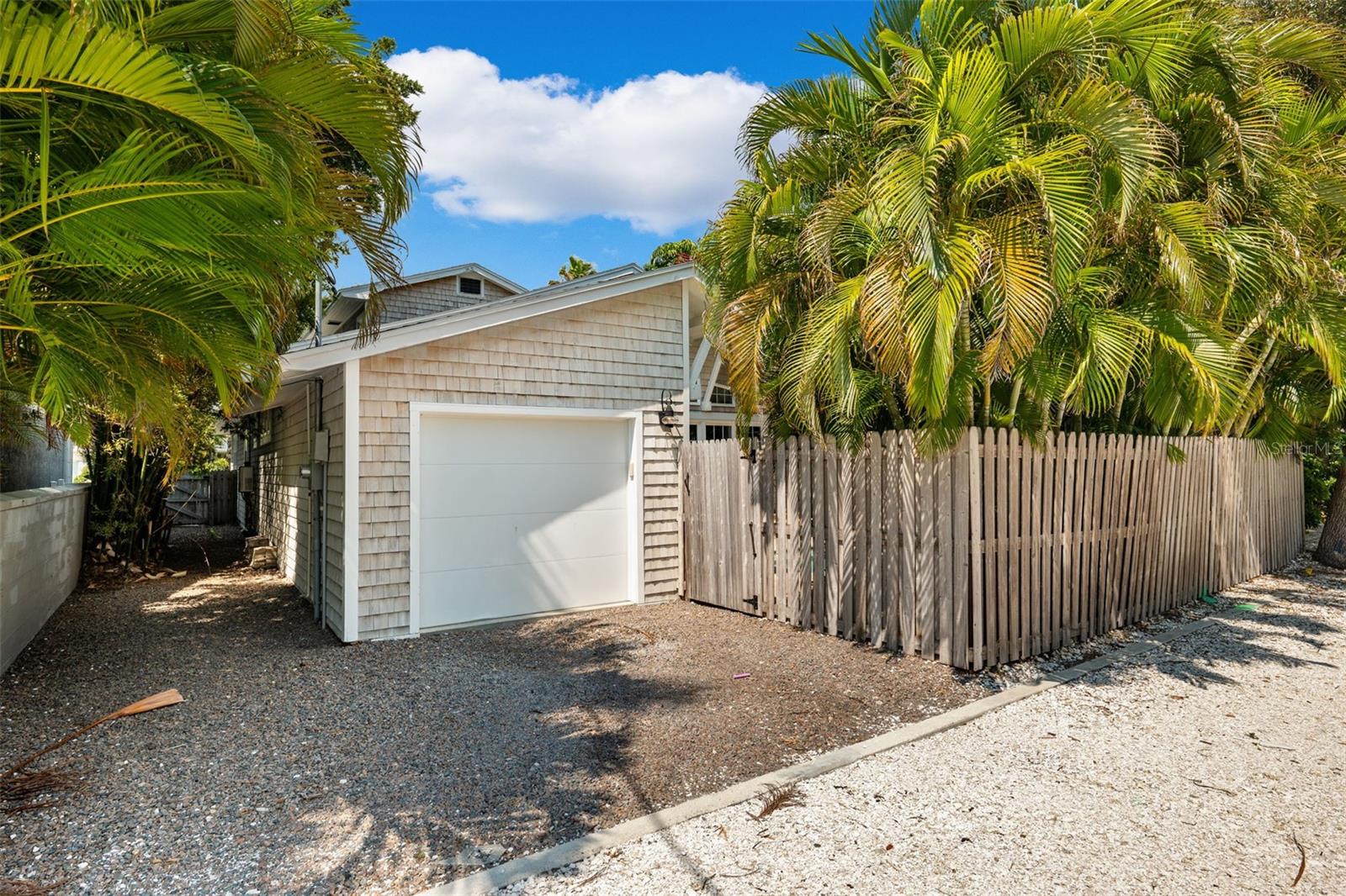 Oversized attached 1 car garage with alley access.