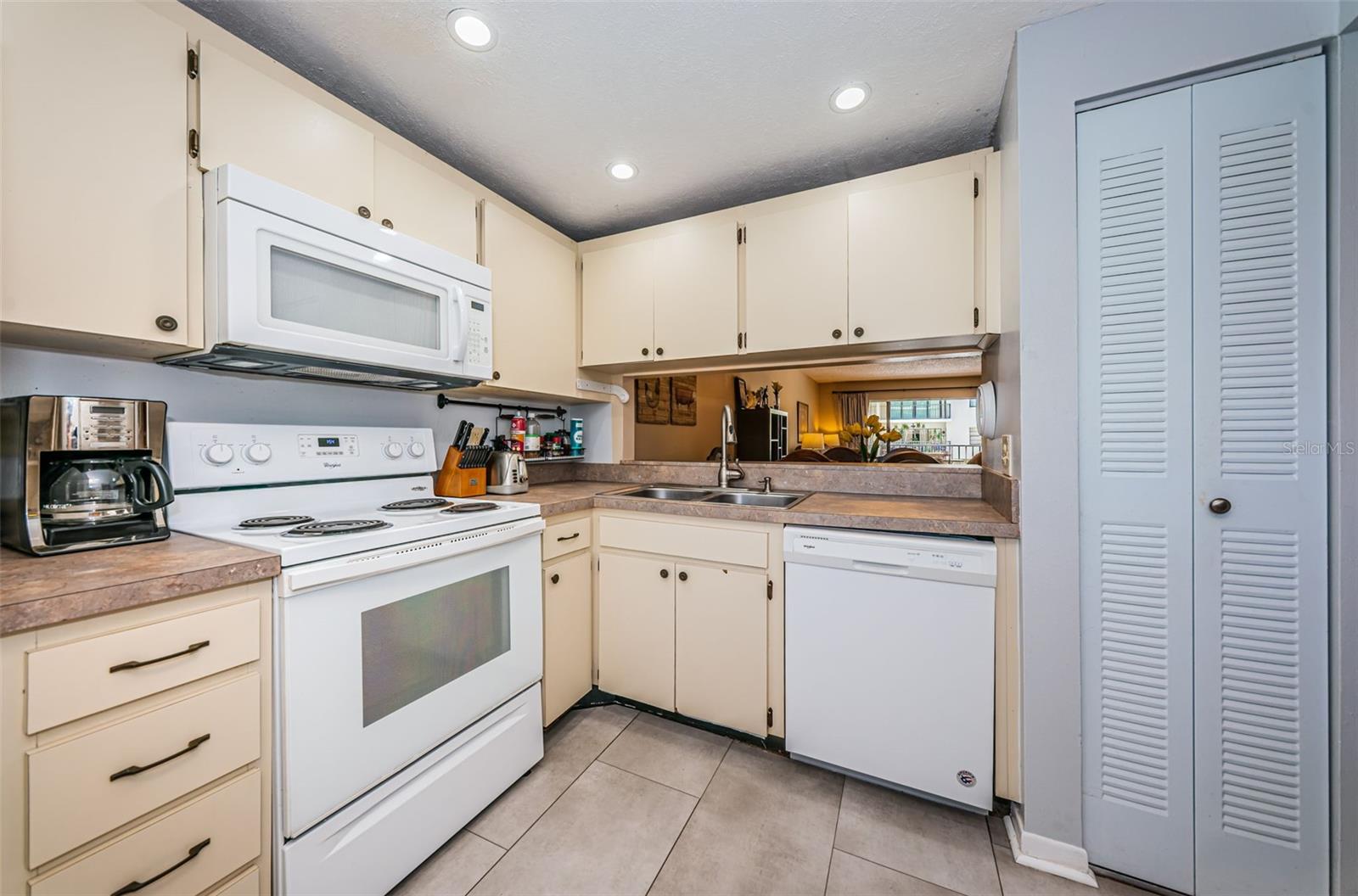 Kitchen with pass through to the Dining area