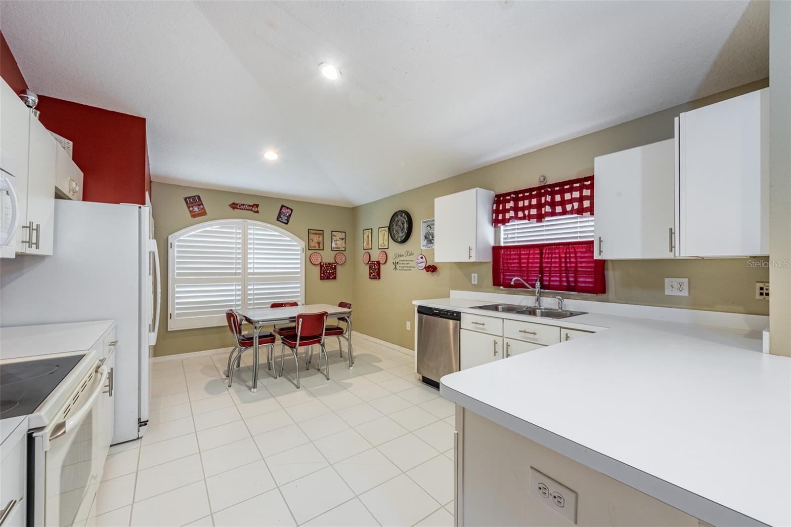 The kitchen has plenty of room for a casual dining table overlooking the front yard.