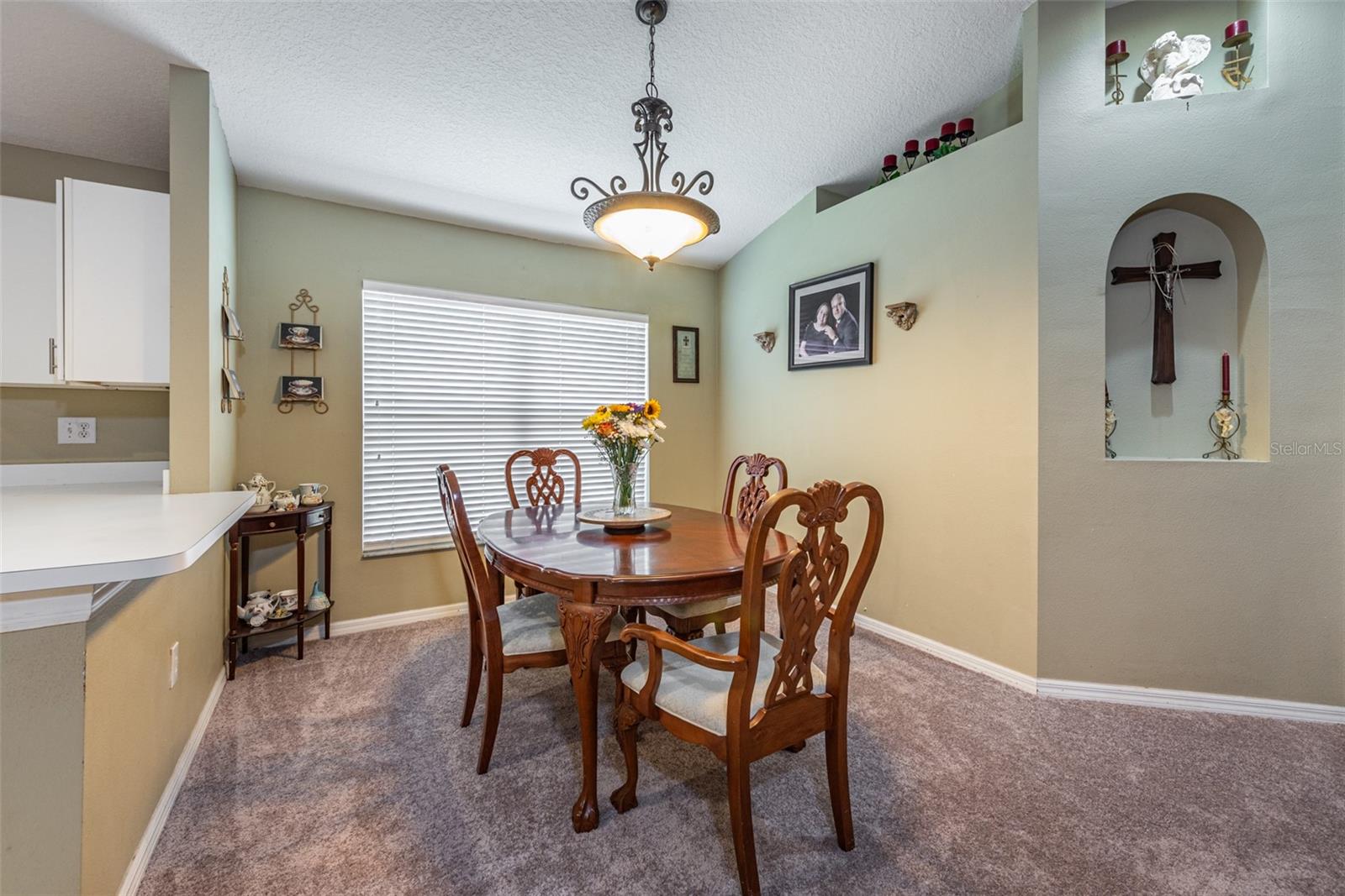 Separate dining room is 11' x 10' and can utilize the kitchen breakfast bar for serving or extra seating.