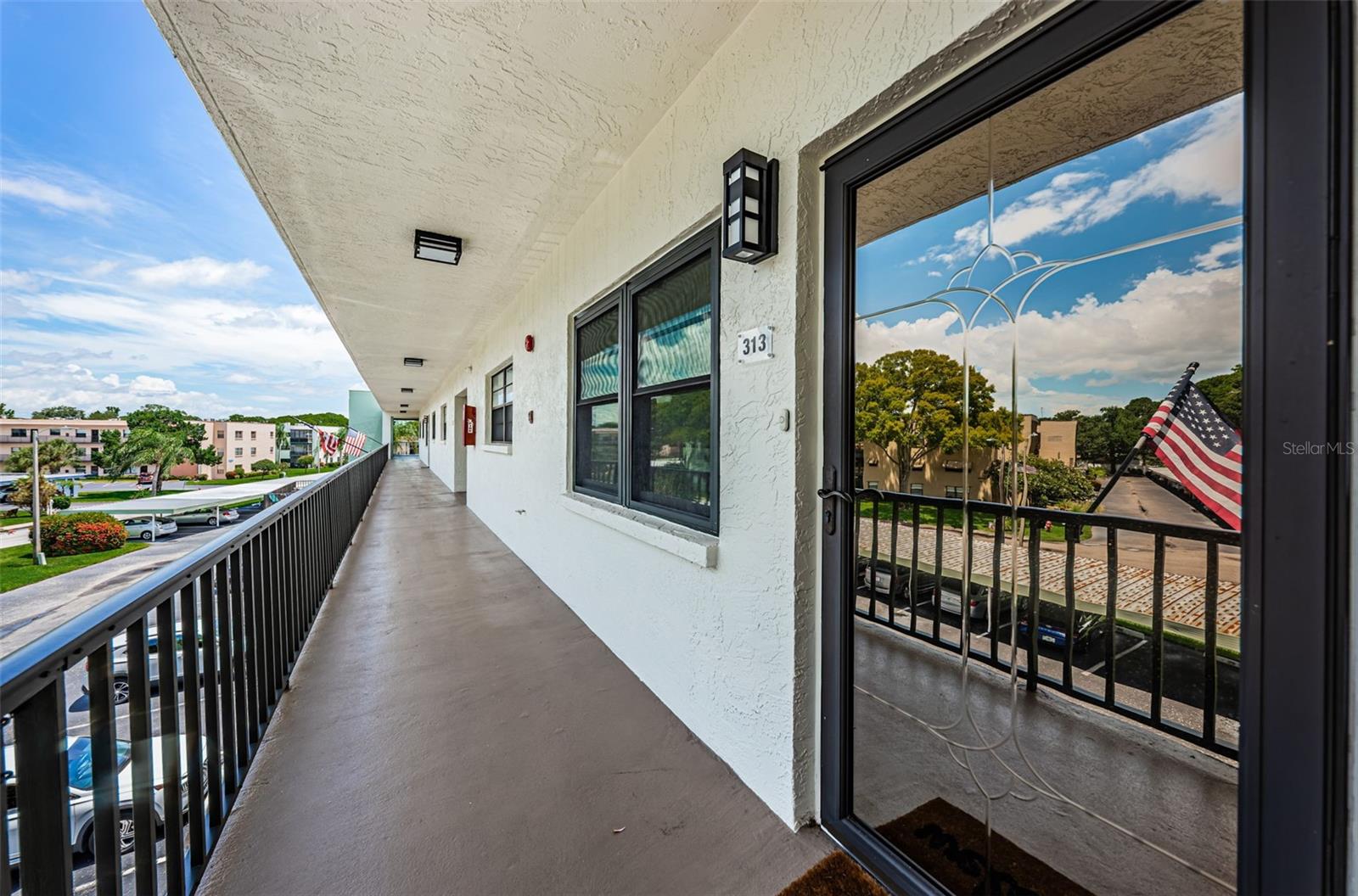 Covered walkway leading to your condo.