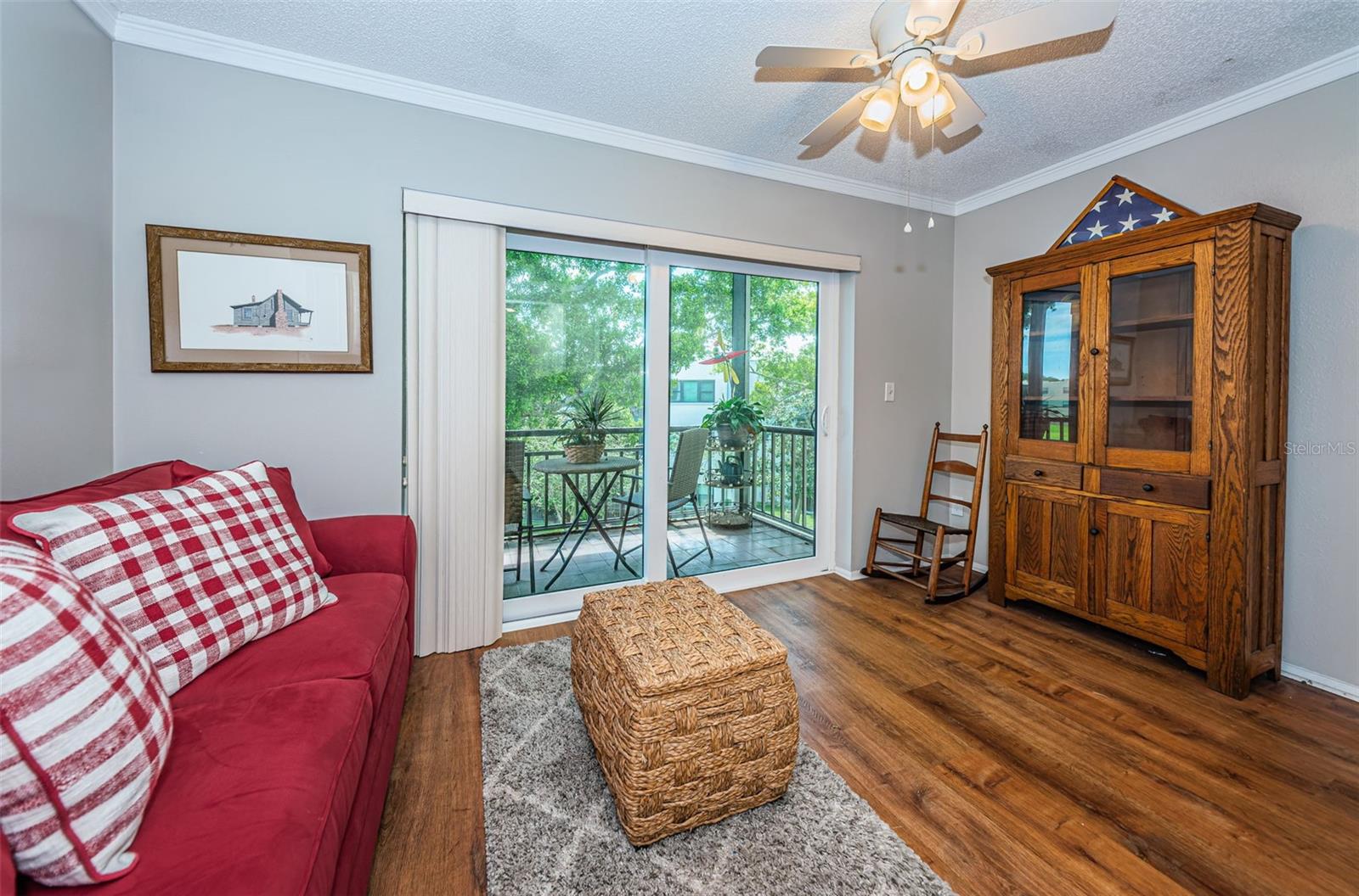 Bonus room with newer slider leading to the screened porch.