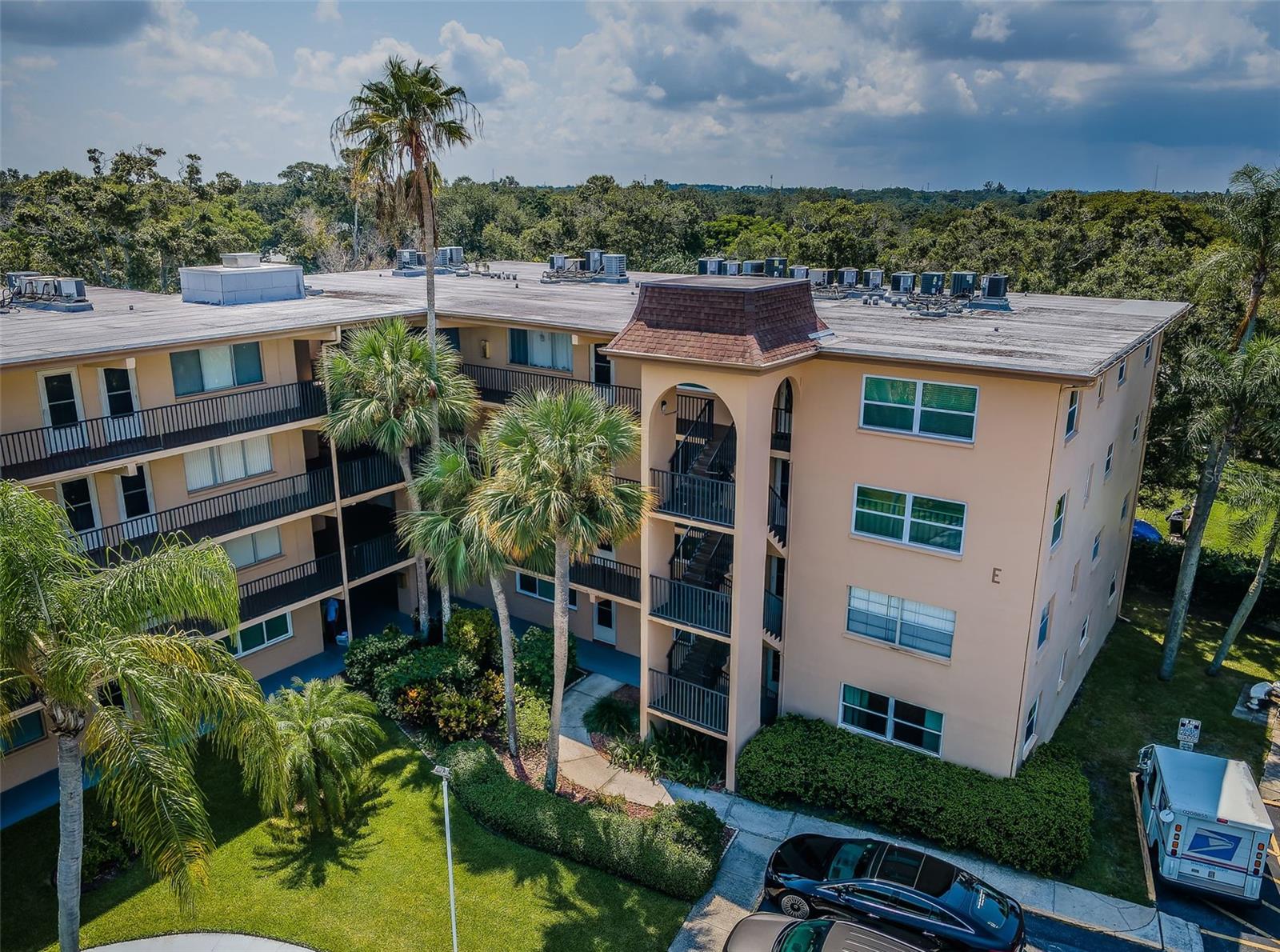 An aerial view showing the condo and its immediate surroundings, providing a clear picture of the property’s layout and neighboring features.