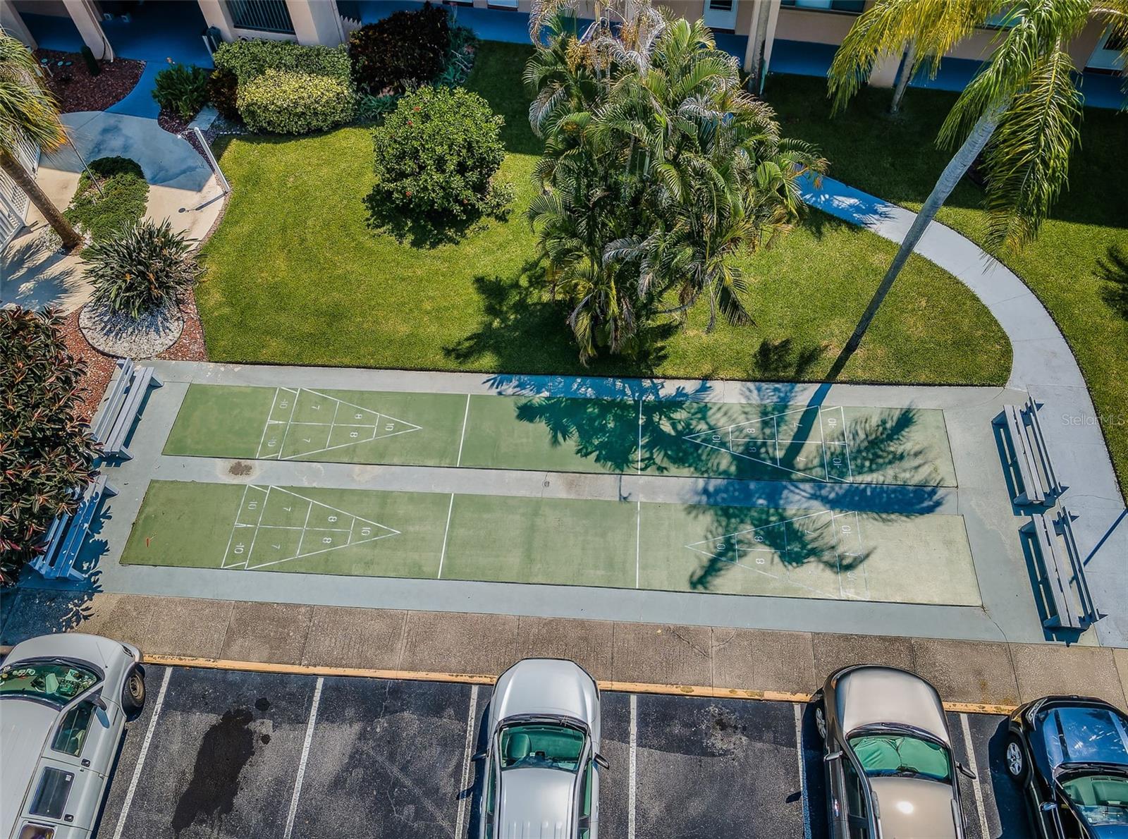 Aerial shot of the shuffleboard court, capturing its design and location in relation to other amenities in the area.