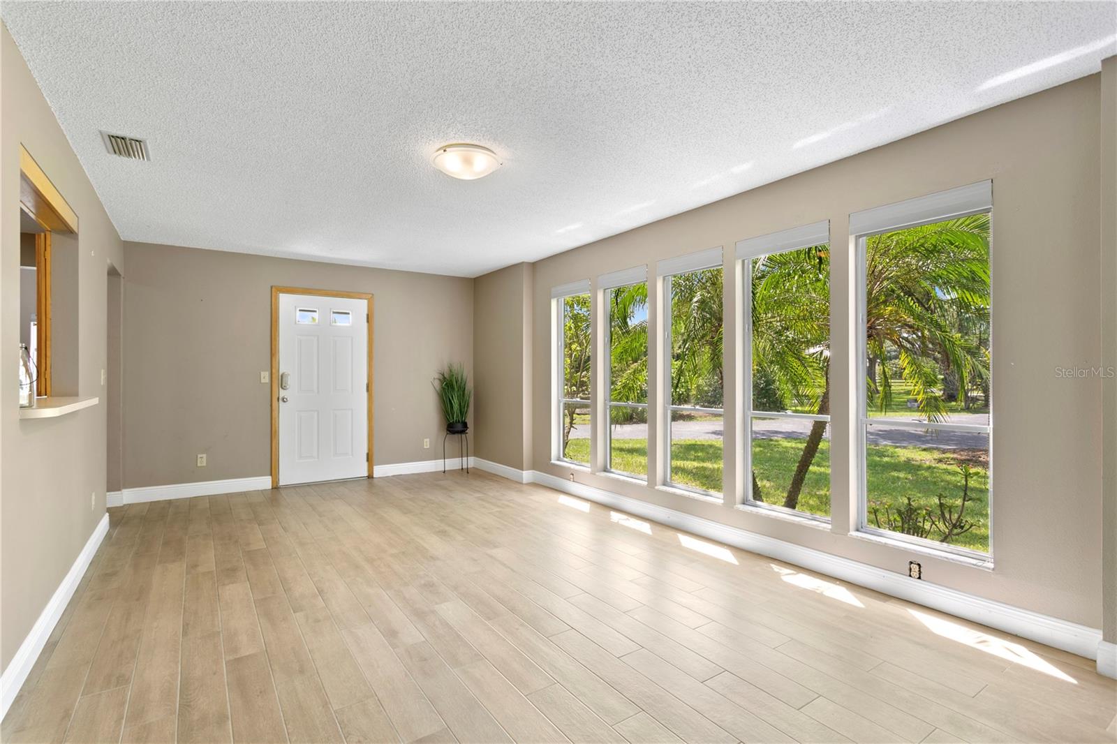 Townhouse entry with view of pond