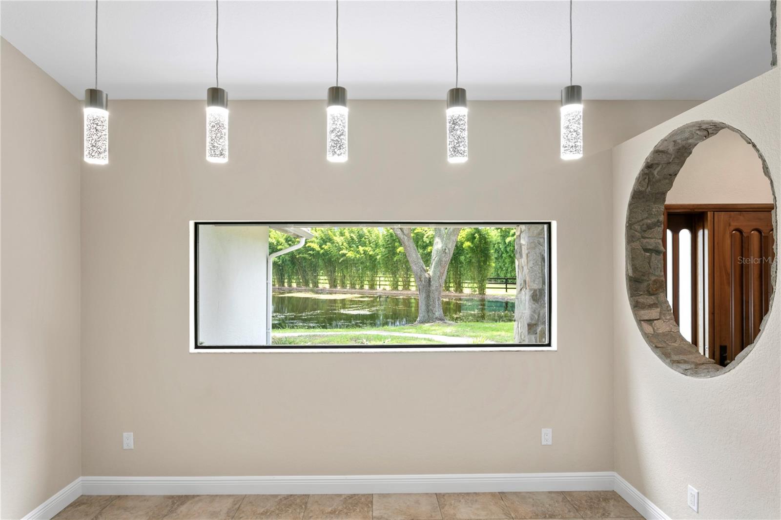 Main House Formal Dining overlooking pond