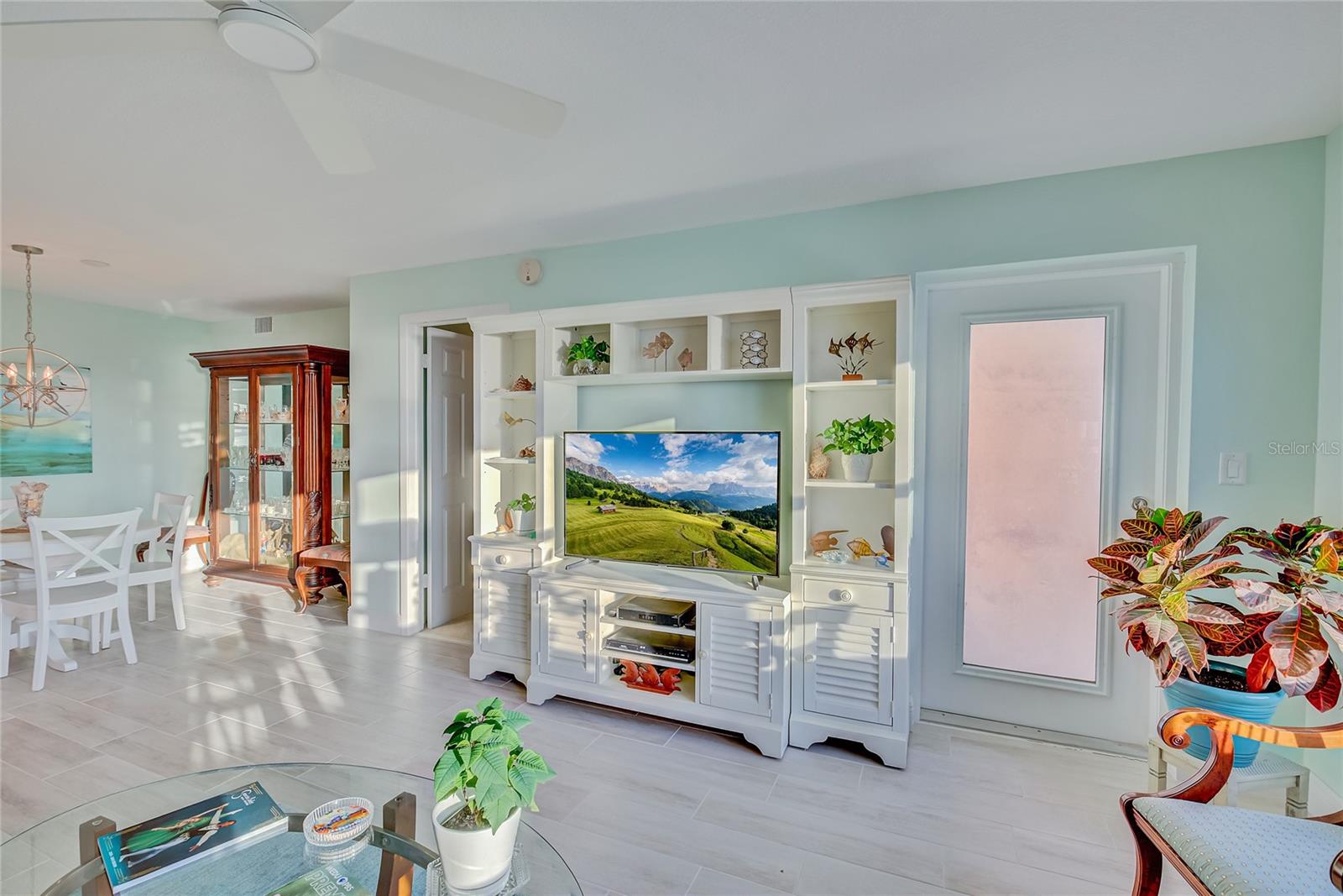 Living room with door to private balcony