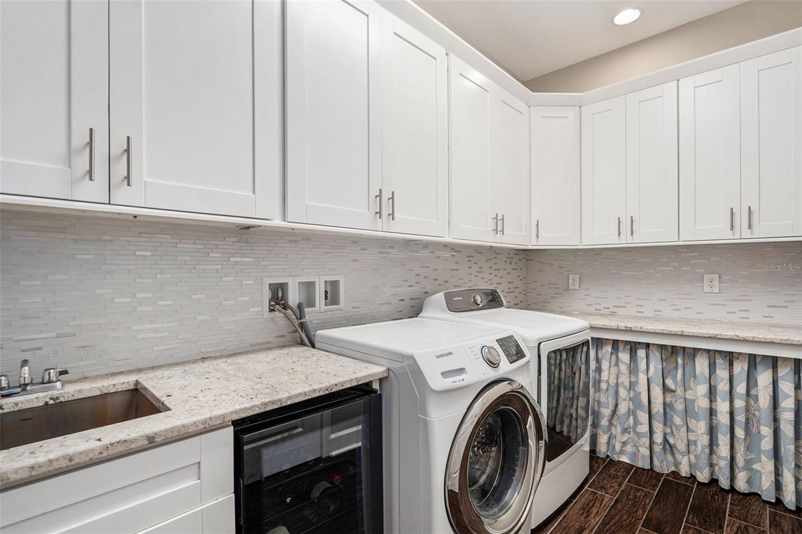 Large Laundryroom with sink and Wine Frig