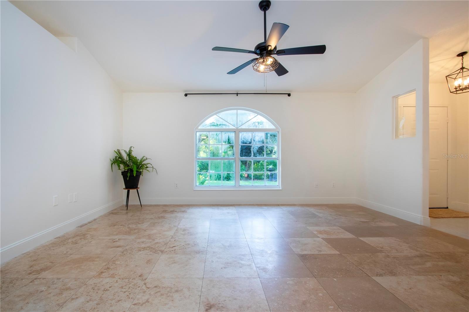 Full view of greatroom with travertine flooring