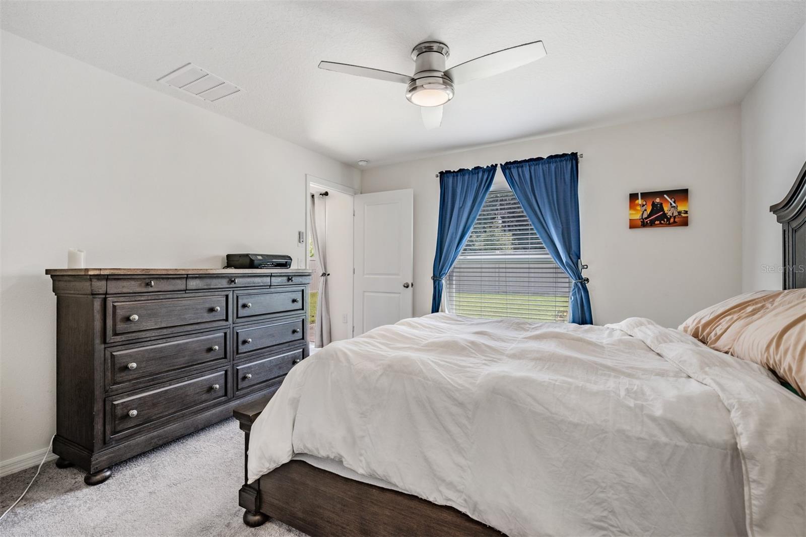 Master Bedroom with ceiling fan.