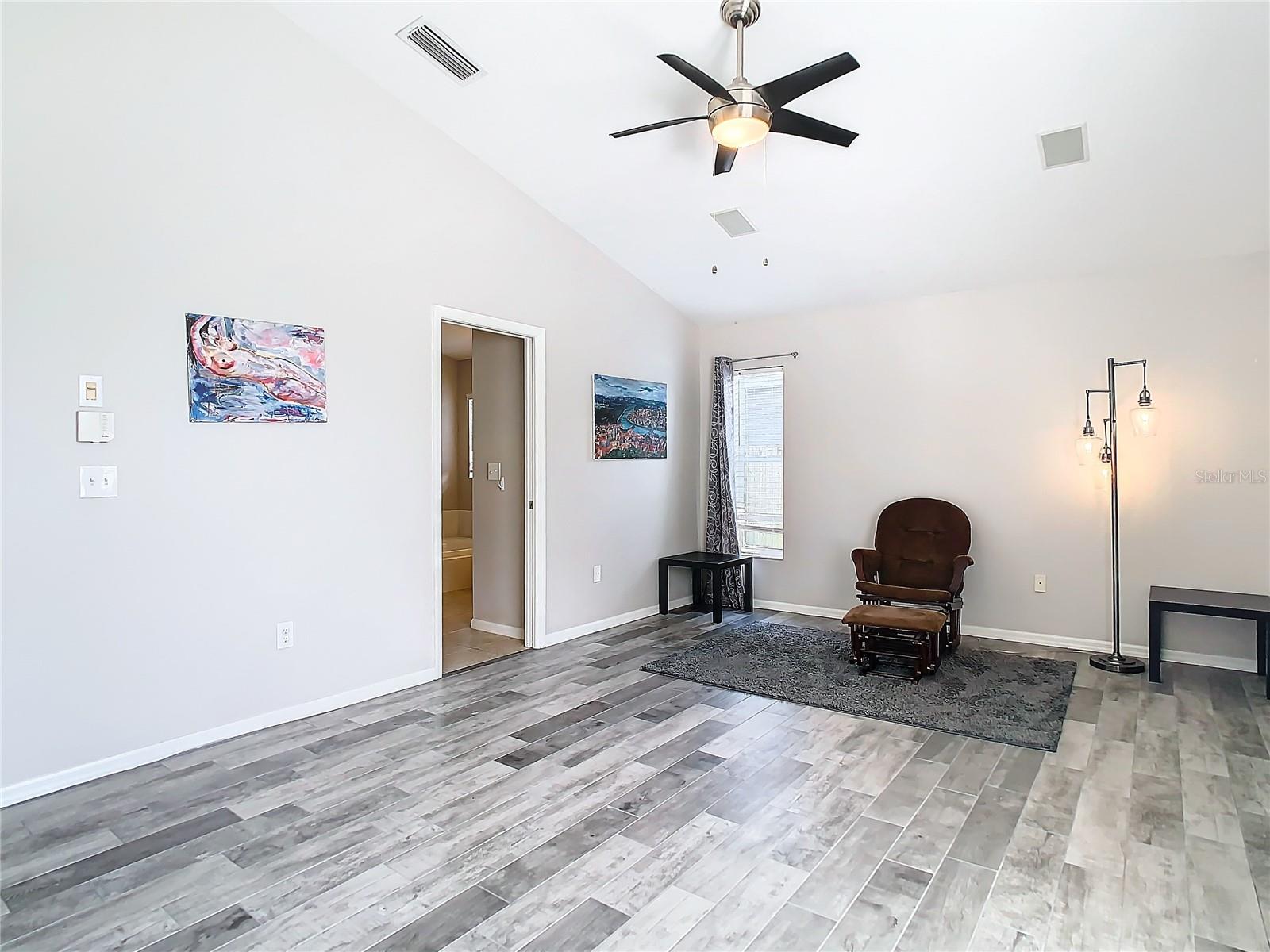 Master Bedroom : large enough for king sized bed and reading chairs