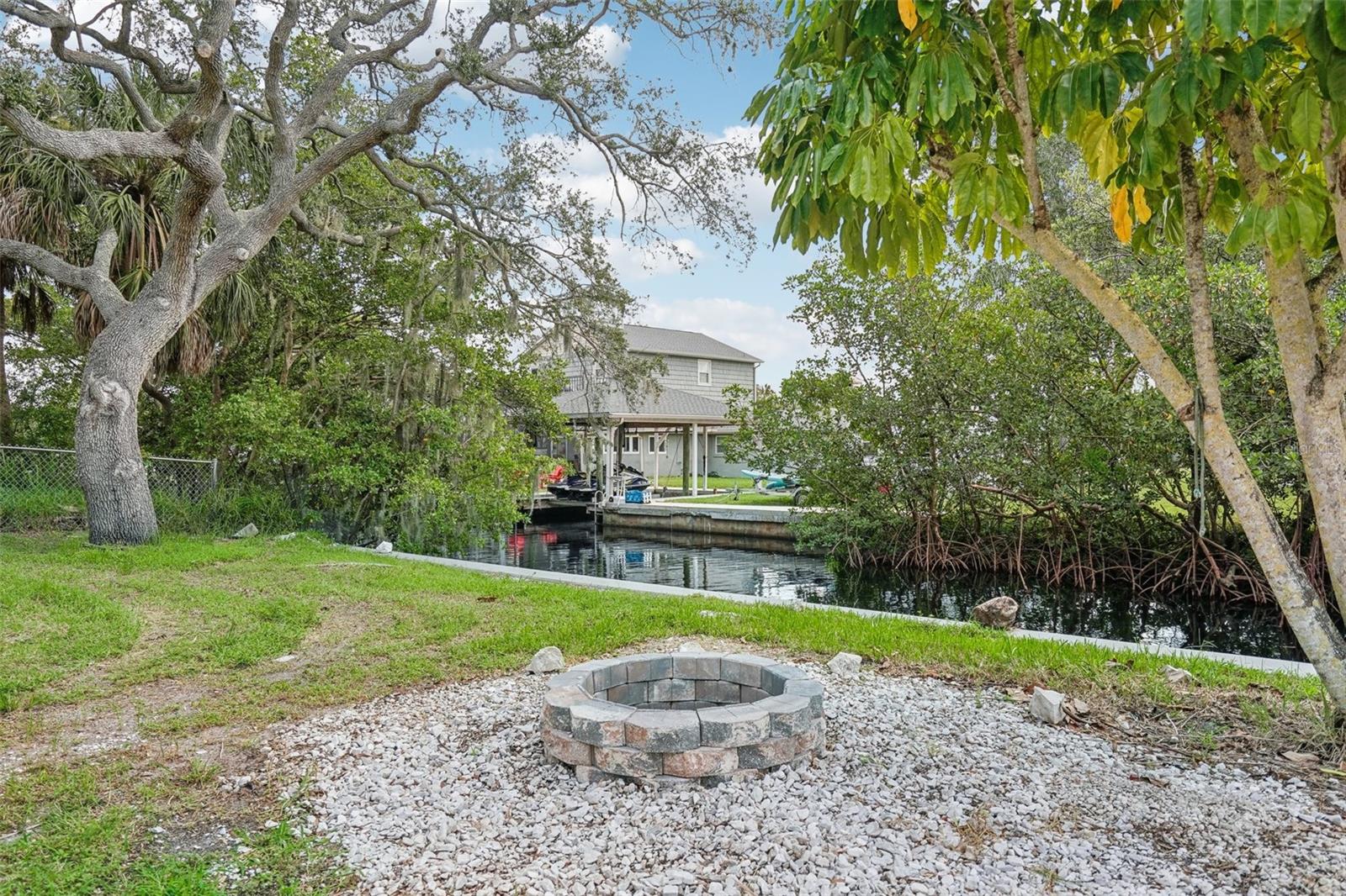 180' of canal-front/water access. Mangroves on opposite side of canal provide privacy from house on the other side.