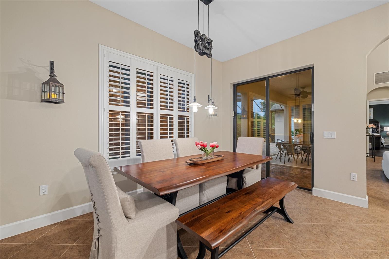 Casual Dining area with sliding door to pool area